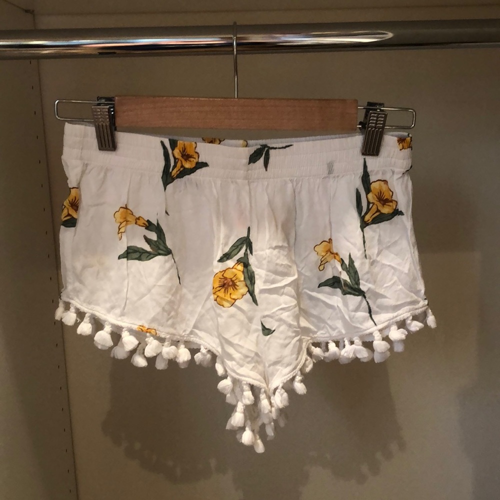 White floral shorts w/ tassel edges